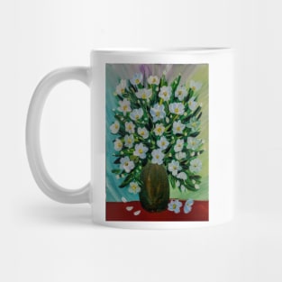 Some white and blue daisy In a gold and turquoise vase . Mug